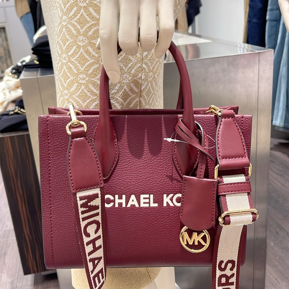 Michael Kors Mirella Small Pebbled Leather Crossbody Bag
Oxblood 
NWT - Picture 15 of 16